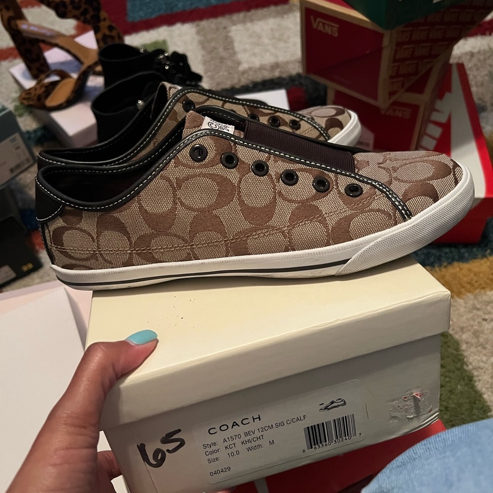 Used Coach slip on tennis shoe